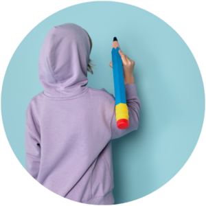 big school boy writing with pencil